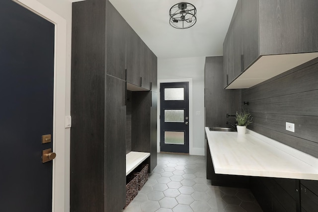 244 Kenmore Ave, Deerfield, IL 60015 - mudroom with light tile patterned floors and a sink