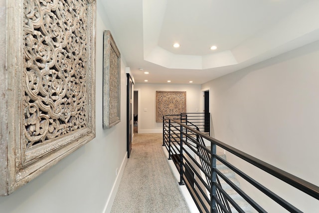 244 Kenmore Ave, Deerfield, IL 60015 - hallway featuring an upstairs landing, recessed lighting, light carpet, baseboards, and a tray ceiling