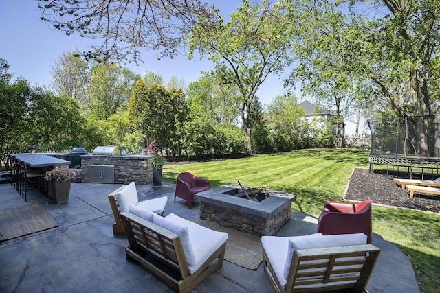 244 Kenmore Ave, Deerfield, IL 60015 - view of patio / terrace featuring a trampoline and an outdoor living space with a fire pit
