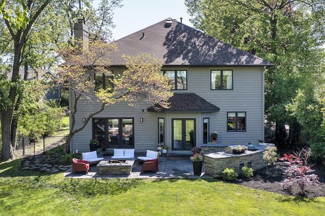 244 Kenmore Ave, Deerfield, IL 60015 - rear view of property featuring french doors, a chimney, roof with shingles, a patio, and an outdoor hangout area