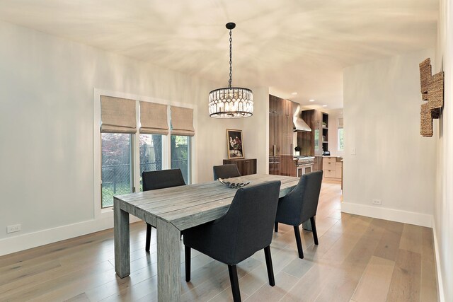 244 Kenmore Ave, Deerfield, IL 60015 - dining room featuring a chandelier, healthy amount of natural light, baseboards, and recessed lighting