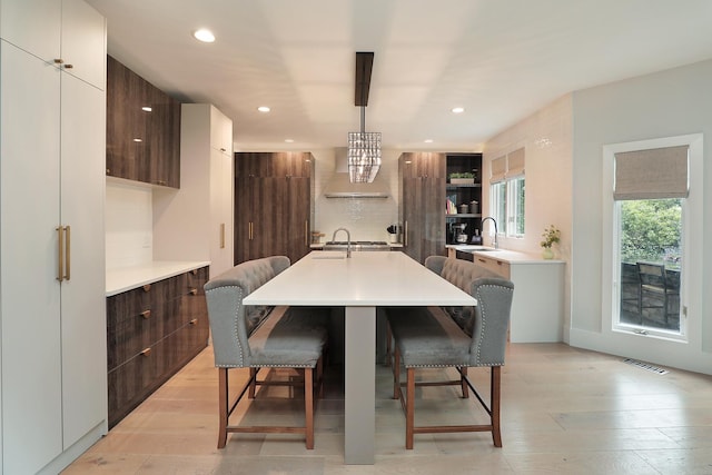 244 Kenmore Ave, Deerfield, IL 60015 - dining room with recessed lighting and light wood-style floors