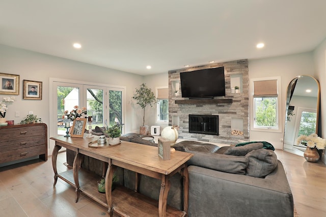 244 Kenmore Ave, Deerfield, IL 60015 - living room with light wood-style floors, recessed lighting, and a fireplace
