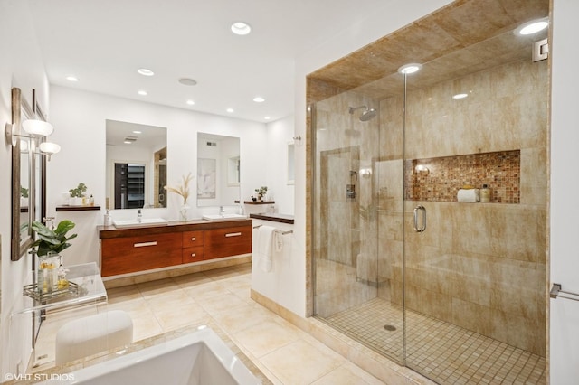 3635 N Paulina St, Chicago, IL 60613 - full bathroom with a stall shower, double vanity, recessed lighting, and tile patterned flooring