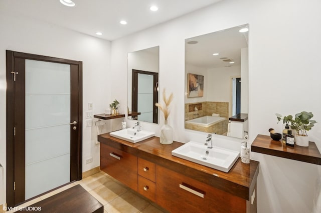 3635 N Paulina St, Chicago, IL 60613 - full bathroom with double vanity, recessed lighting, a bathtub, and tile patterned floors