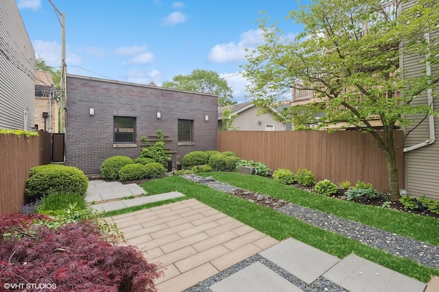 3635 N Paulina St, Chicago, IL 60613 - fenced backyard with a patio