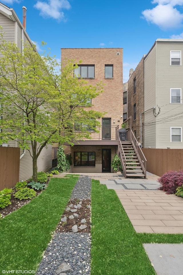 3635 N Paulina St, Chicago, IL 60613 - back of house featuring stairs and a deck