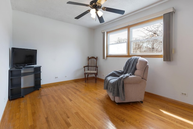 410 W Kirchhoff Rd, Arlington Heights, IL 60005 - sitting room with light wood-style flooring, ceiling fan, and baseboards