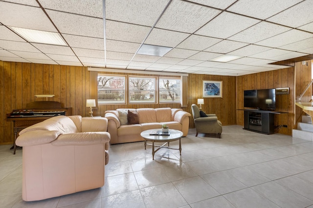 410 W Kirchhoff Rd, Arlington Heights, IL 60005 - living area featuring wood walls, a drop ceiling, and tile patterned floors