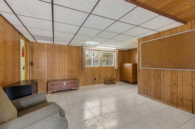 410 W Kirchhoff Rd, Arlington Heights, IL 60005 - unfurnished living room with wooden walls and light tile patterned flooring