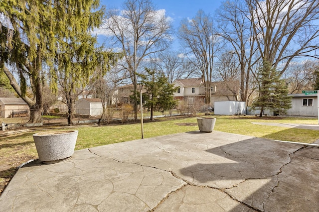 410 W Kirchhoff Rd, Arlington Heights, IL 60005 - view of patio featuring a residential view and an outbuilding