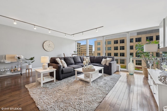 340 W Diversey Pkwy Unit 1020, Chicago, IL 60657 - living area with rail lighting and wood-type flooring