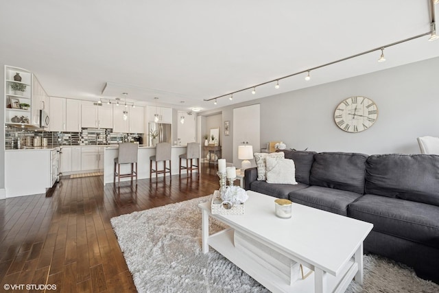 340 W Diversey Pkwy Unit 1020, Chicago, IL 60657 - living room with rail lighting and dark wood finished floors