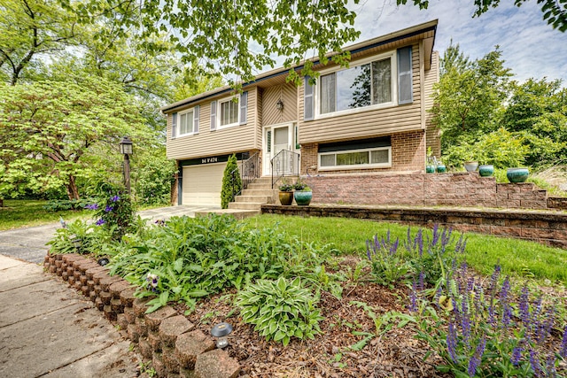 24W474 Surf Ct, Naperville, IL 60540 - raised ranch with an attached garage, brick siding, and concrete driveway