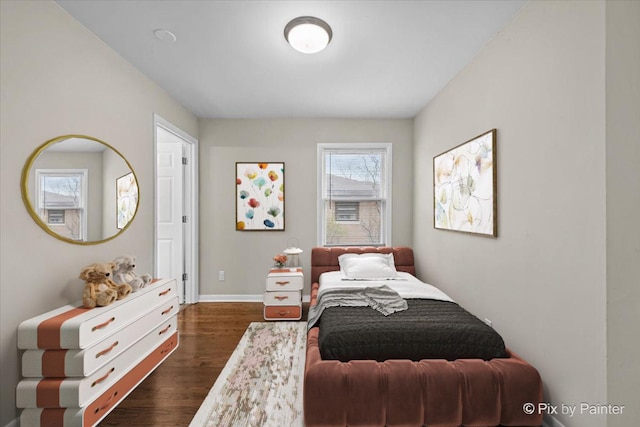 18371 Gladville Ave, Homewood, IL 60430 - bedroom featuring dark wood finished floors and baseboards