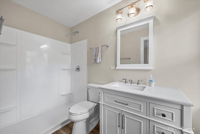 18371 Gladville Ave, Homewood, IL 60430 - full bathroom with a shower, vanity, wood finished floors, and toilet
