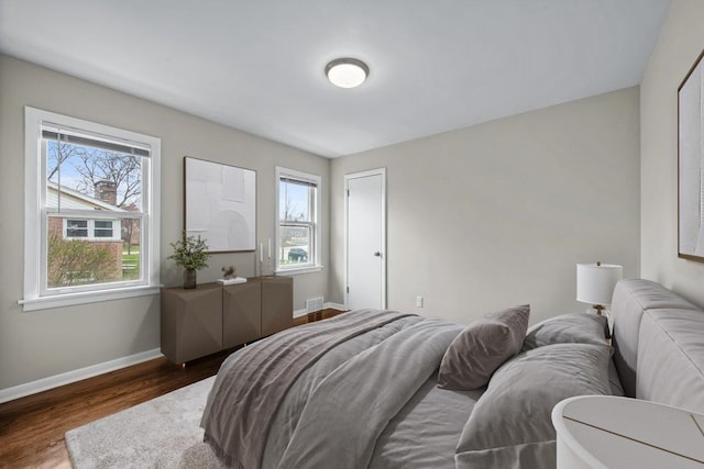 18371 Gladville Ave, Homewood, IL 60430 - bedroom with wood finished floors and baseboards