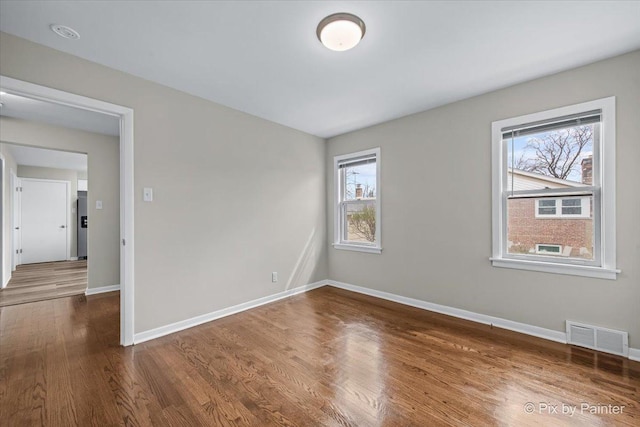 18371 Gladville Ave, Homewood, IL 60430 - unfurnished room featuring wood finished floors and baseboards