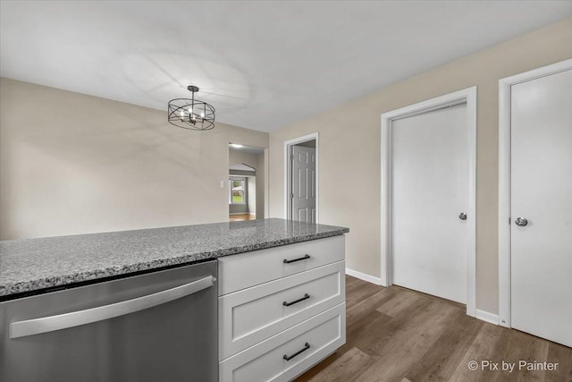 18371 Gladville Ave, Homewood, IL 60430 - kitchen featuring dishwasher, dark wood-type flooring, white cabinets, light stone counters, and baseboards