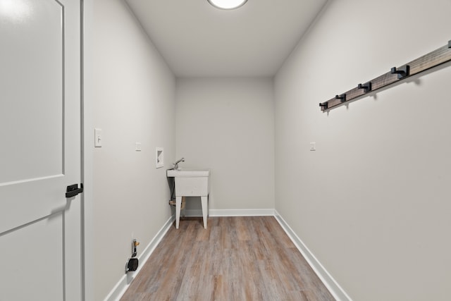 22308 S Eastcliff Dr, Joliet, IL 60404 - laundry room with washer hookup and light wood finished floors
