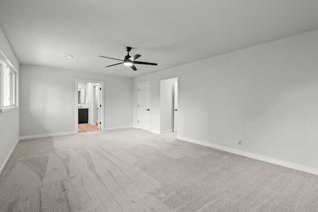 22308 S Eastcliff Dr, Joliet, IL 60404 - unfurnished bedroom featuring light carpet, ensuite bath, and ceiling fan