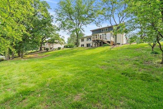22308 S Eastcliff Dr, Joliet, IL 60404 - view of grassy yard with a deck and stairway
