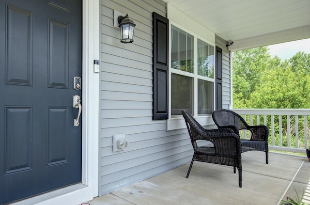 208 Cooper St, Plano, IL 60545 - doorway to property with covered porch