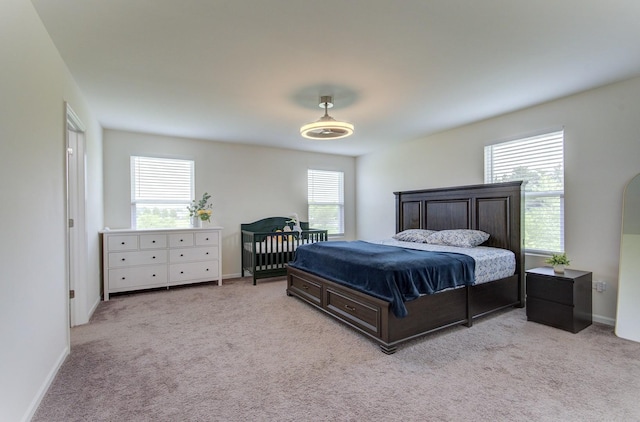 208 Cooper St, Plano, IL 60545 - carpeted bedroom featuring baseboards