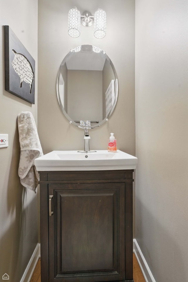 3404 Royal Woods Dr, Crystal Lake, IL 60014 - bathroom with baseboards, wood finished floors, and vanity