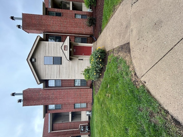 2044 N Rand Rd Unit 107, Palatine, IL 60074 - view of front of house with brick siding