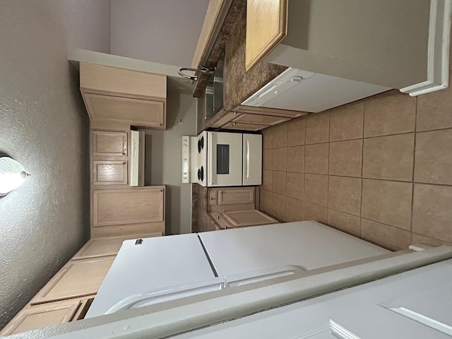 2044 N Rand Rd Unit 107, Palatine, IL 60074 - kitchen with a textured wall and backsplash