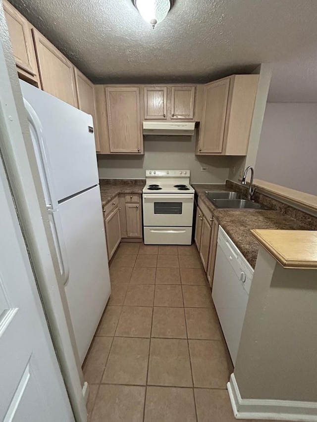 2044 N Rand Rd Unit 107, Palatine, IL 60074 - kitchen with white appliances, a sink, under cabinet range hood, a textured ceiling, and a peninsula