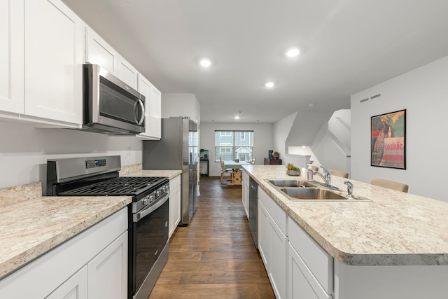 846 Briar Glen Ct, Hampshire, IL 60140 - kitchen featuring stainless steel appliances, a sink, dark wood-style floors, recessed lighting, and white cabinets