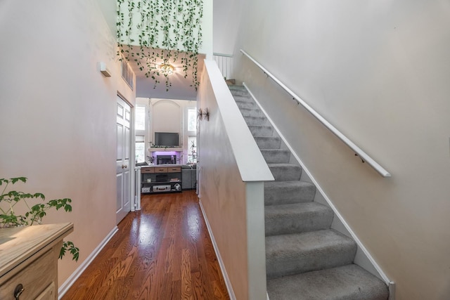 3021 Tangley Oaks Trl, Lisle, IL 60532 - stairs with wood finished floors, a high ceiling, and baseboards