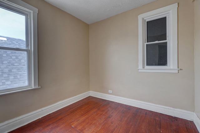 1837 S 50th Ct, Cicero, IL 60804 - unfurnished room featuring dark wood finished floors and a textured ceiling