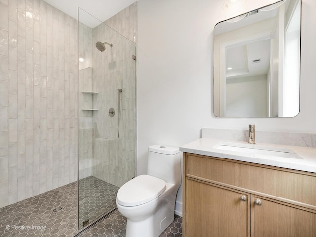 1853 W Barry Ave, Chicago, IL 60657 - full bath with toilet, vanity, tiled shower, and tile patterned floors