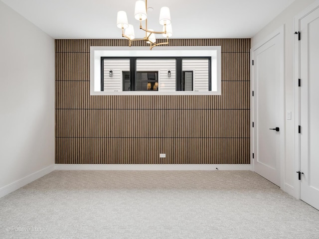 1853 W Barry Ave, Chicago, IL 60657 - unfurnished room with carpet and a chandelier