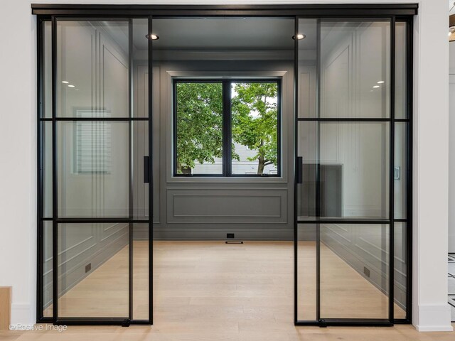 1853 W Barry Ave, Chicago, IL 60657 - interior space with a decorative wall and light wood-type flooring