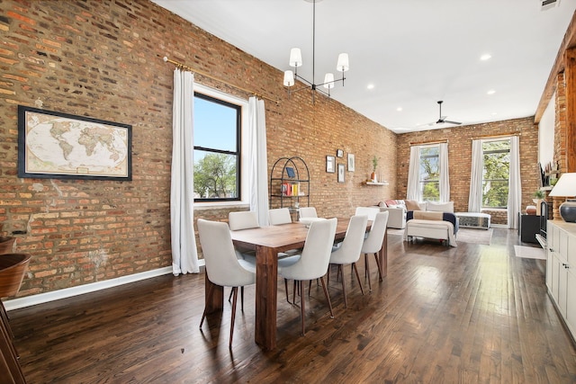 1014 N Milwaukee Ave Unit 2, Chicago, IL 60642 - dining area with brick wall, dark wood-type flooring, ceiling fan, recessed lighting, and baseboards
