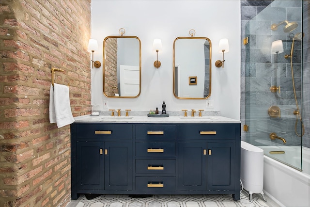 1014 N Milwaukee Ave Unit 2, Chicago, IL 60642 - bathroom featuring brick wall, double vanity, and shower / bath combination