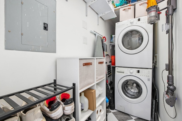 1014 N Milwaukee Ave Unit 2, Chicago, IL 60642 - laundry room featuring stacked washer / dryer and electric panel
