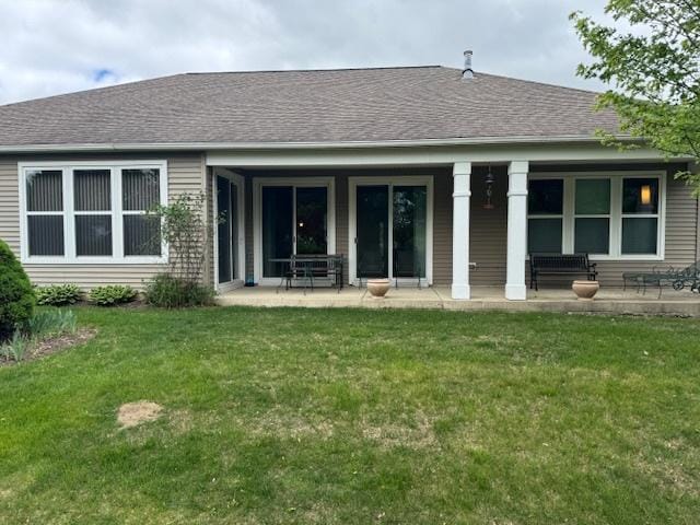 3881 Melody St, Mundelein, IL 60060 - rear view of house with a yard and a patio