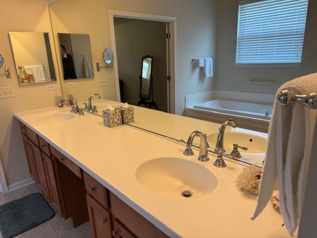 3881 Melody St, Mundelein, IL 60060 - full bathroom with double vanity, tile patterned flooring, and a bath