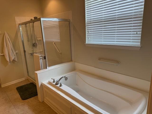 3881 Melody St, Mundelein, IL 60060 - full bath with a garden tub, a shower stall, tile patterned floors, and baseboards
