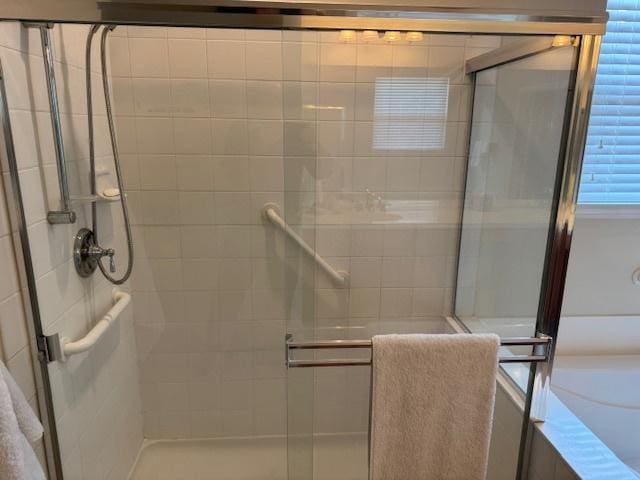 3881 Melody St, Mundelein, IL 60060 - bathroom featuring a shower stall and a bath