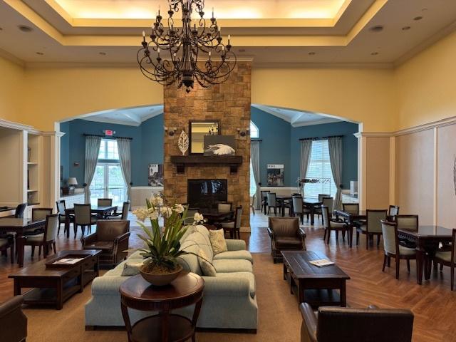 3881 Melody St, Mundelein, IL 60060 - common area featuring a high ceiling and ornamental molding