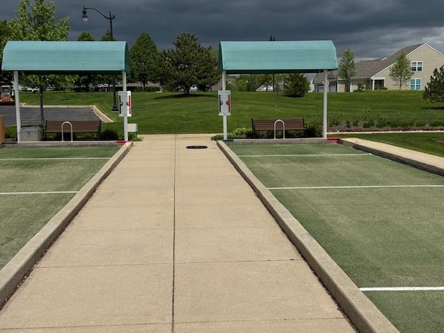 3881 Melody St, Mundelein, IL 60060 - surrounding community featuring a bocce ball area and a yard