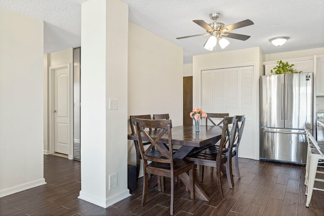 2211 S Highland Ave Unit 1B, Lombard, IL 60148 - dining space featuring dark wood-style flooring, a textured ceiling, ceiling fan, and baseboards