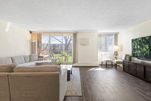 2211 S Highland Ave Unit 1B, Lombard, IL 60148 - living room featuring a textured ceiling, dark wood-style flooring, and floor to ceiling windows