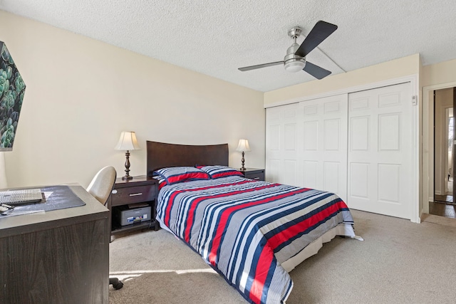 2211 S Highland Ave Unit 1B, Lombard, IL 60148 - bedroom featuring carpet flooring, a closet, a textured ceiling, and ceiling fan